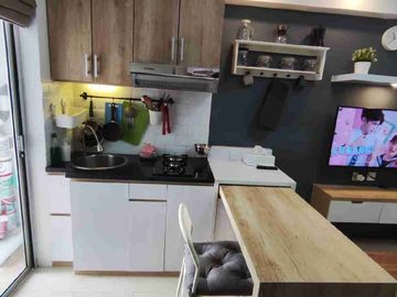 Sewa 2BR Hook  Lantai Rendah diatas Family Mart Tower Heliconia Bassura City Apartement