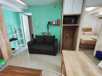 Sewa 2BR Hook  Lantai Rendah diatas Family Mart Tower Heliconia Bassura City Apartement