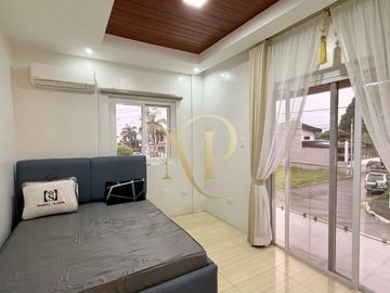LOT SIZE: 453 SQM - FURNISHED HIGH CEILING 4 BEDROOM HOUSE WITH HUGE OPEN SPACE FOR RENT NEAR SM TELABASTAGAN