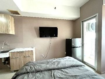 Disewakan Perbulan Studio Furnished Lt tinggi Siap Huni Apartemen Green Lake Sunter