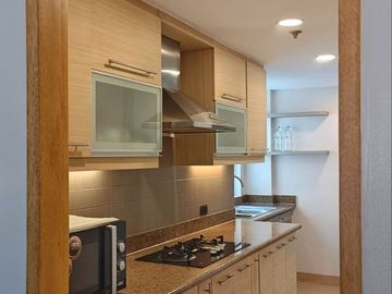 Refurbished 130 SQM 2BR with Wrap-Around Connected Balcony & Parking for Rent at Le Domaine, Salcedo Village, Makati