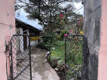 Vendo propiedad amplia con locales comerciales, áreas verdes y casa en Tucuso - Machachi