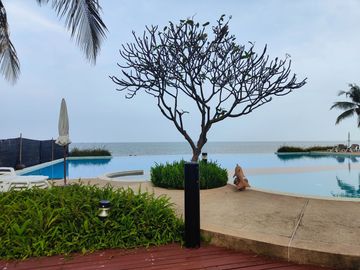 Condo for sale at Baan Plearn Talay. Cha-am, Phetchaburi Province condo resort style next to private beach very large facilities, big gardens , 2 swim