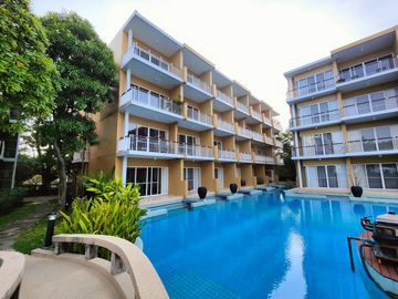 Condo for sale at Baan Plearn Talay. Cha-am, Phetchaburi Province condo resort style next to private beach very large facilities, big gardens , 2 swim