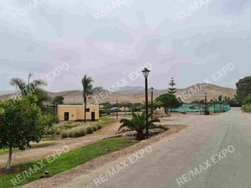 VENDO TERRENO DE 1,500 M2  IDEAL PARA CASA DE CAMPO EN EL EXCLUSIVO CONDOMINIO LAS COLINAS DE PUERTO VIEJO, KM 73.5 DE LA PANAMERICANA SUR.