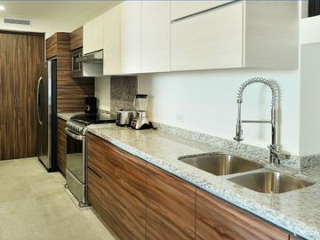Departamento con vista al mar, alberca infinity y area de asador, spa y gimnasio, venta en Cabo San Lucas.