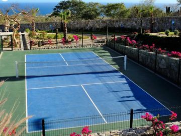 Departamento con vista al mar, alberca infinity y area de asador, spa y gimnasio, venta en Cabo San Lucas.