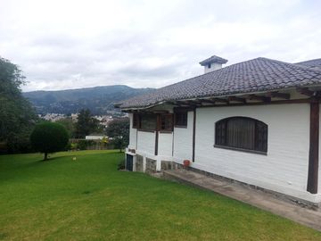 GRAN TERRENO CON CASA TIPO HACIENDA EN TUMBACO LA VIÑA ALTA