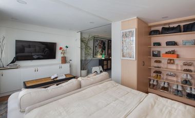 Stylishly Furnished 1-Bedroom Condo with Convertible 2nd Bedroom, Roof Deck, and More in Merville, Parañaque For SALE!