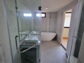 Kristada Nakhon 21 Bangna opposite Mega Bangna has a modern contemporary home for sale with a pool.