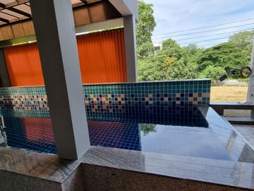 Kristada Nakhon 21 Bangna opposite Mega Bangna has a modern contemporary home for sale with a pool.