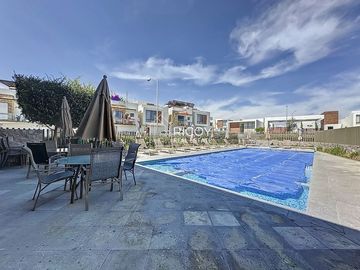 Magnífica casa en condominio con alberca y vigilancia