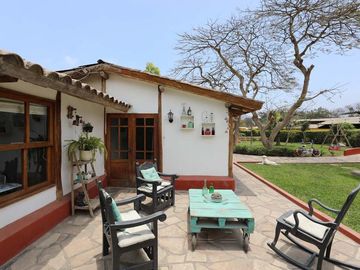 Propiedad en Pachacamac: Nave Industrial con Área Agroindustrial y 3 Casas