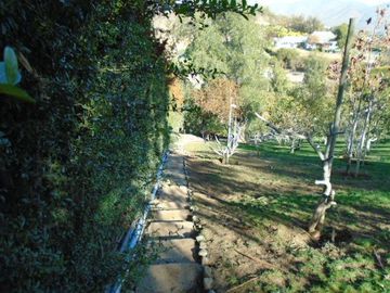 SE VENDE PARCELA CON CASA EN SECTOR LOMAS DEL PUANGUE