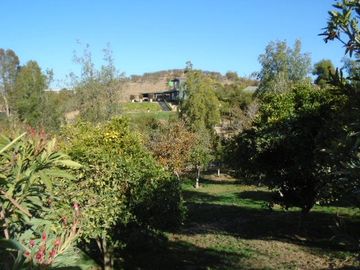 SE VENDE PARCELA CON CASA EN SECTOR LOMAS DEL PUANGUE