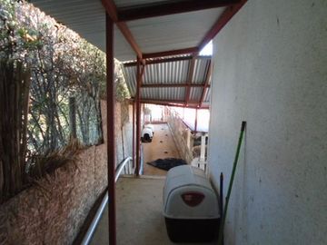 SE VENDE PARCELA CON CASA EN SECTOR LOMAS DEL PUANGUE