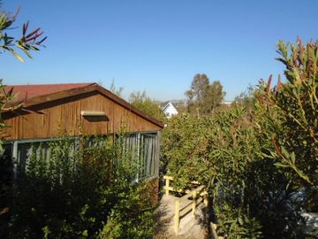 SE VENDE PARCELA CON CASA EN SECTOR LOMAS DEL PUANGUE