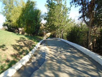 SE VENDE PARCELA CON CASA EN SECTOR LOMAS DEL PUANGUE