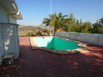 SE VENDE PARCELA CON CASA EN SECTOR LOMAS DEL PUANGUE