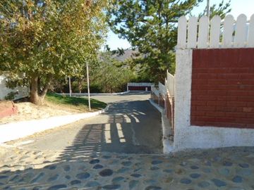 SE VENDE PARCELA CON CASA EN SECTOR LOMAS DEL PUANGUE