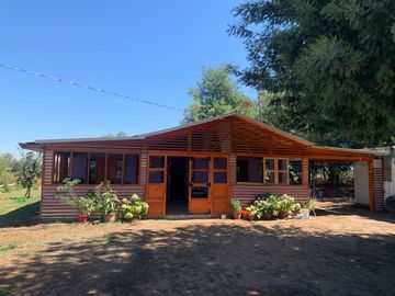 Se vende parcela 7.430 m2 con casa en Pelarco