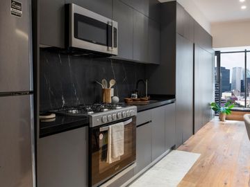 Condo de lujo, alberca, terraza, gimnasio, en venta Roma Norte CDMX.