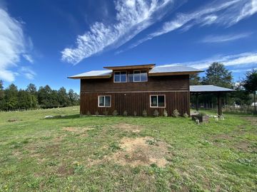 Z O N A S U R . C L Destino habitacional o comercial casa  terreno de 5.000 m2 a orilla de camino público Pedregoso Villarrica