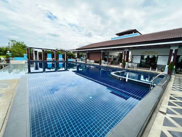 Spacious house for sale on the corner beside the lake in Mooban Ornsirin 3 San Pu Loei, Doi Saket
