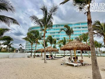 NUEVO VALLARTA | DEPARTAMENTO A PIE DE PLAYA EN MARITIMA PLAYA - ENTREGA INMEDIATA