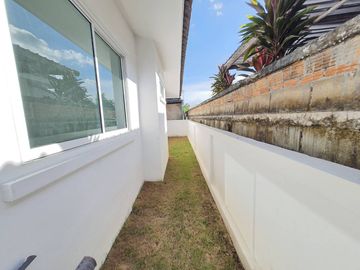 House for sale, size 4 bedrooms, 2 bathrooms, 67 sq m., corner plot.   Khum Phaya Garden Home Project, Soi 11, Chiang Mai-Hang Dong Road.     Opposite