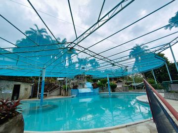 Hot Spring Resort for sale in Pansol Laguna good location near National High way