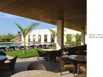 Departamento con cuarto de lavado y amenidades en residencial con campo de golf en Yucatan Country Club.
