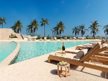 Departamento con vistas al mar y a la marina, muelle, golf, marina en venta en Puerto Cancún.