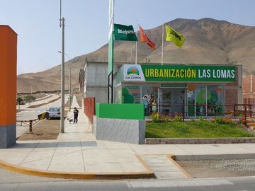 Venta de 2 lotes contiguos para vivienda, en urbanización Lomas de Pucusana, zona segura, con amplios parques, juegos para niños, pórtico de ingresos