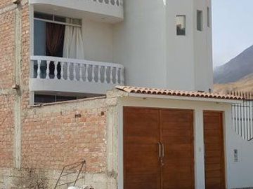 Venta de 2 lotes contiguos para vivienda, en urbanización Lomas de Pucusana, zona segura, con amplios parques, juegos para niños, pórtico de ingresos