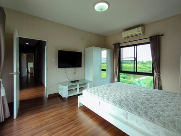 Modern style house for sale with fish pond in a secured Mooban, San Kamphaeng, Chiang Mai