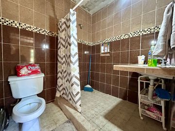 Terreno en venta con construcción en Chichi Suarez en Mérida Yucatán