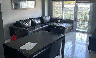 Prime Address, Exceptional Living: Two Serendra Almond Lantern Loft – a unique 2 Bedroom, with a view of High Street. Fully Furnished with 1 Parking S