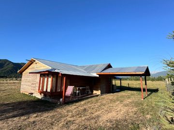 Parcela con 3 cabañas amobladas, cambio de Uso de Suelo y Urbanización en trámite.