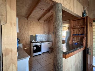 Parcela con 3 cabañas amobladas, cambio de Uso de Suelo y Urbanización en trámite.