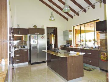 Gorgeous One Level Home with Private Lake in Heart of LLanogrande