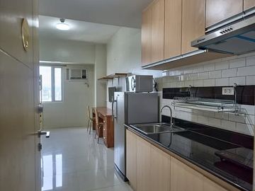 SUN27XXT1: For Sale Fully Furnished Studio with Balcony in Sun Residences, Quezon City