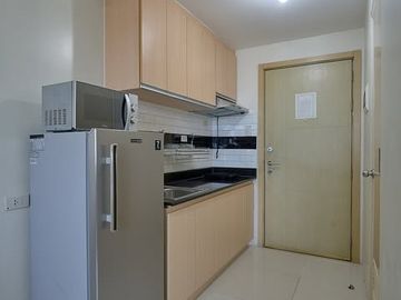 SUN27XXT1: For Sale Fully Furnished Studio with Balcony in Sun Residences, Quezon City