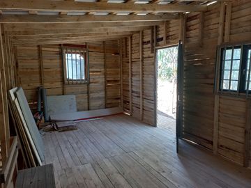 Valle Alegre, parcela 20.000 mts, cercada, con construcciones y pozo