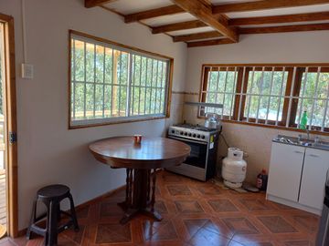 Valle Alegre, parcela 20.000 mts, cercada, con construcciones y pozo