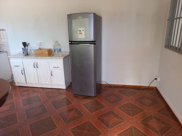 Valle Alegre, parcela 20.000 mts, cercada, con construcciones y pozo