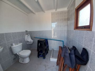 Valle Alegre, parcela 20.000 mts, cercada, con construcciones y pozo