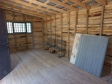 Valle Alegre, parcela 20.000 mts, cercada, con construcciones y pozo