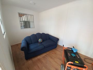 Valle Alegre, parcela 20.000 mts, cercada, con construcciones y pozo
