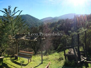 Leon Propiedades vende parcela con casa en sector las Achiras, Curacavi.